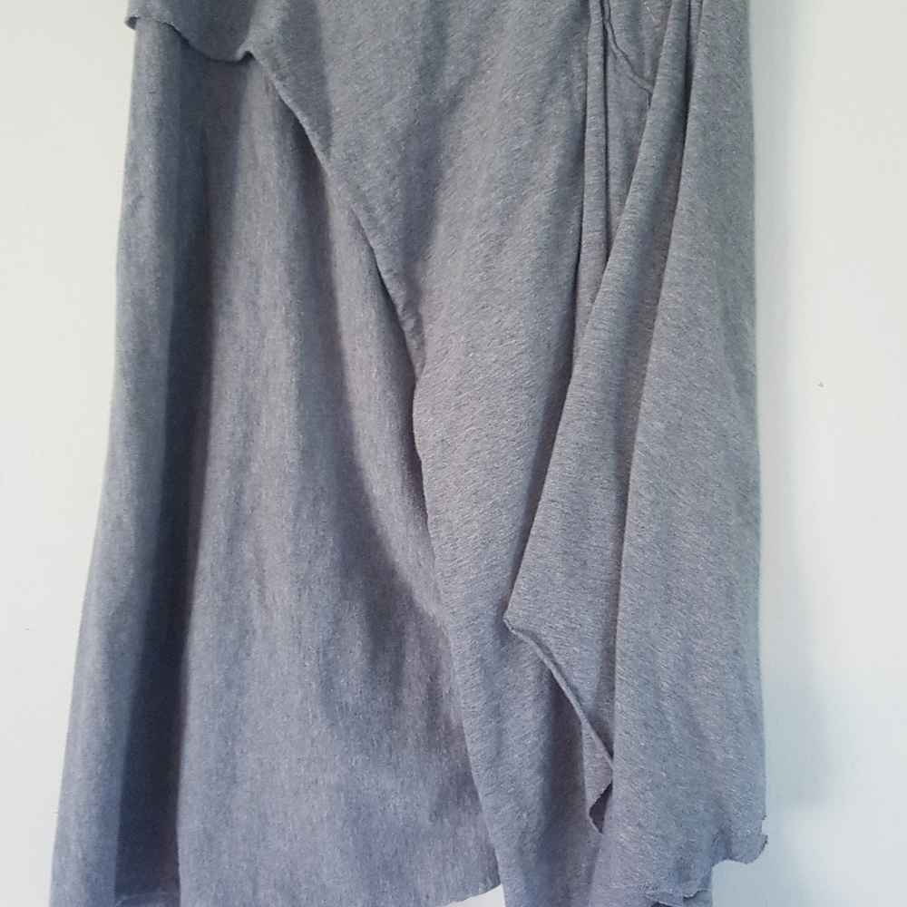 Gray asymmetrical skirt.